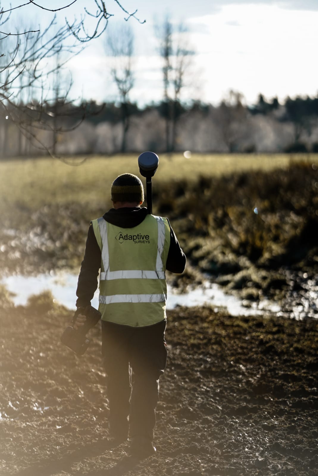 an Adaptive Surveys worker finding a place to set up his supplies