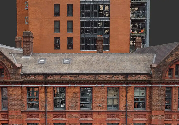 an edited photo of a two old large and tall orange-red buildings